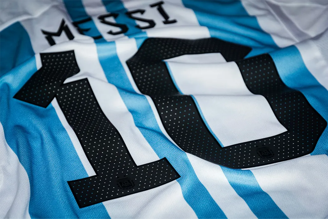 Close-up of the number 10 and the name Messi on the back of an Argentina shirt